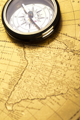 Fototapeta na wymiar Compass on the old map background