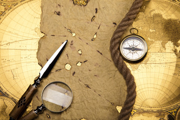 Obraz na płótnie Canvas Compass on the old paper background