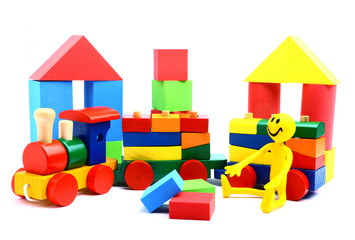 Colorful wooden toy train isolated on white background
