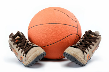 The new sports shoes with the ball on a white background.