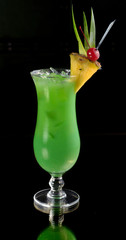 green cocktail with pineapple