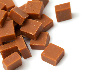 caramel candies on white