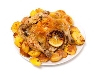 roasted chicken and potatoes on white background