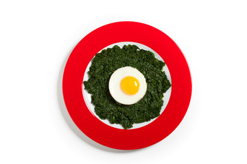 Spiegelei auf Blattspinat