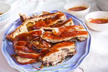 Grilled suckling pig on a plate