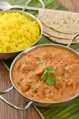 Butter Chicken & Lemon Rice -Indian curry on a banana leaf