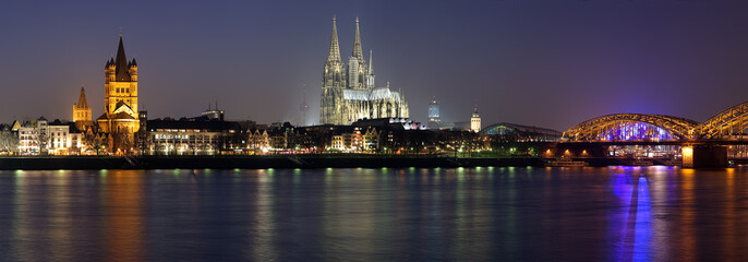 Naklejka premium Evening panorama of Cologne from the Rhine river, Germany