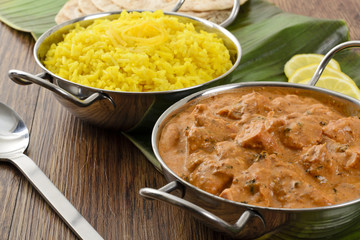 Butter Chicken & Lemon Rice -Indian curry on a banana leaf