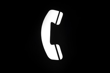 Black and white telephone boot sign