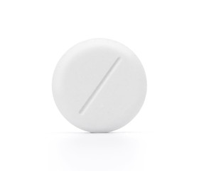 Macro shot of white pill isolated on white background