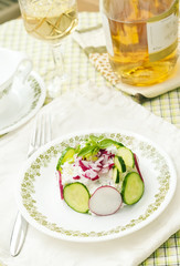 Vitamin salad with radish and cucumbers