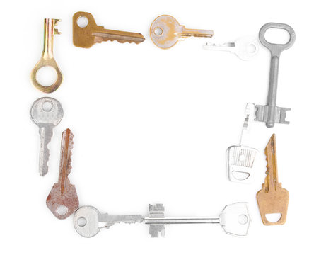 Many metal keys isolated on white