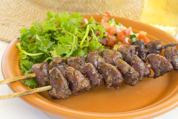 BBQ Chicken Heart - Grilled chicken hearts on skewers with salsa