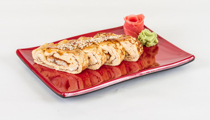 Omelet Maki Sushi - Roll made of Smoked Eel inside. Topped with