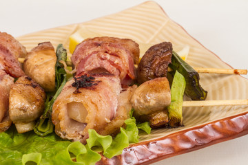 Bacon wrapped grilled Scallops with mushrooms and bacon