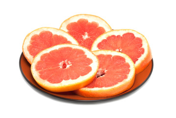 Fototapeta na wymiar The grapefruit cut with circles
