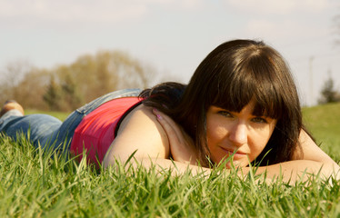 pretty girl in the green grass