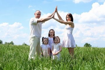 family with children in summer day outdoors