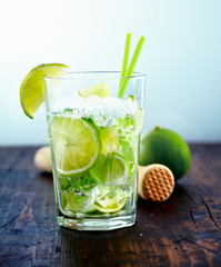 Refreshing drink with fresh lime slices