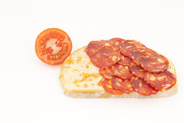 Bread with tomato and sausage