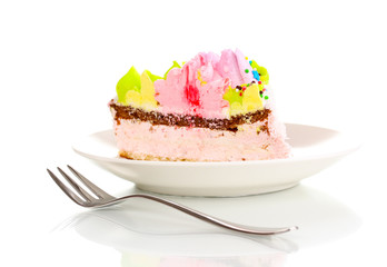 Creamy cake on saucer isolated on white