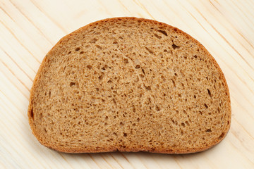 Bread slice on wooden table