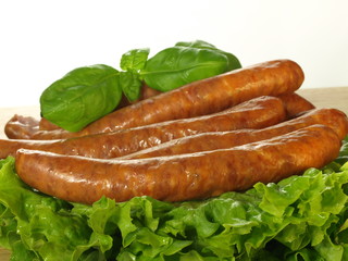Sausage with lettuce, closeup