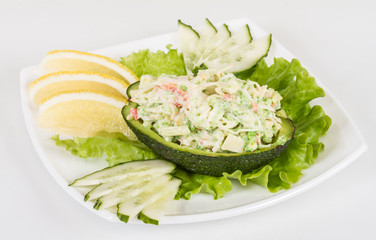 Crab meat salad with green caviar in avocado - japan cusine