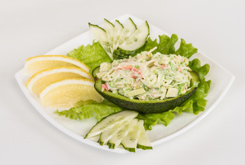 Crab meat salad with green caviar in avocado - japan cusine