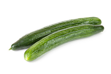 Two fresh cucumbers, isolated over white