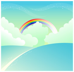 mountain slope and rainbow in sky