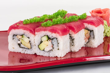 Maki Sushi - Roll made of Crab, avocado, cucumber inside. Fresh