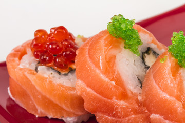 Japanese sushi traditional japanese food.Roll made of salmon, re