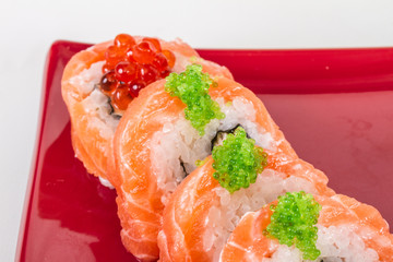 Japanese sushi traditional japanese food.Roll made of salmon, re