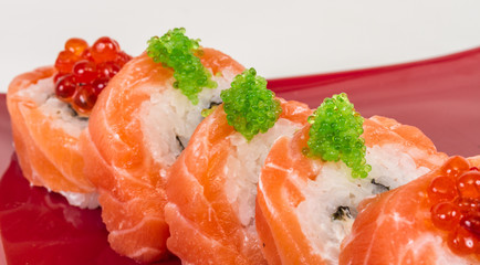 Japanese sushi traditional japanese food.Roll made of salmon, re