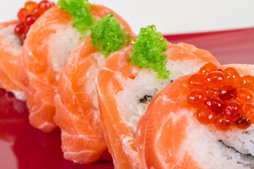 Japanese sushi traditional japanese food.Roll made of salmon, re