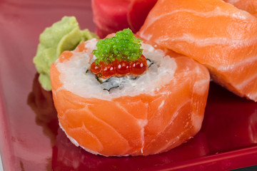 Japanese sushi traditional japanese food.Roll made of salmon, re