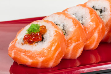 Japanese sushi traditional japanese food.Roll made of salmon, re