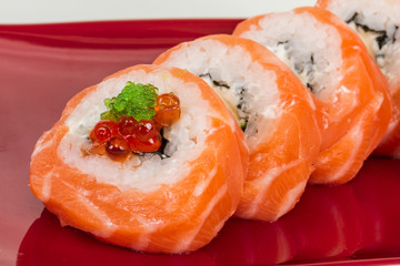 Japanese sushi traditional japanese food.Roll made of salmon, re