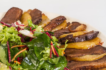 duck fillet, mashed potatoes seasoned with truffle oil, fig and
