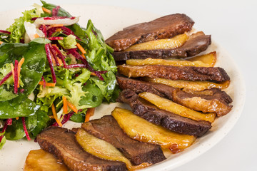 duck fillet, mashed potatoes seasoned with truffle oil, fig and