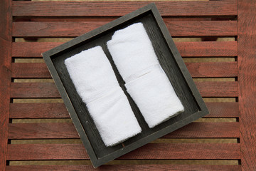white men's hand kerchiefs in a series in a wooden box at a high
