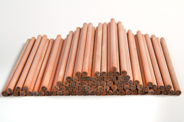 Wooden pencil on a white background.