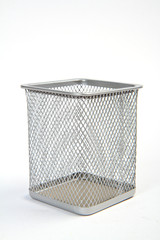 Empty wire metal bin on white background