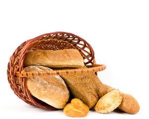Beautiful bread set in basket on white background