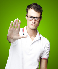 man doing stop symbol