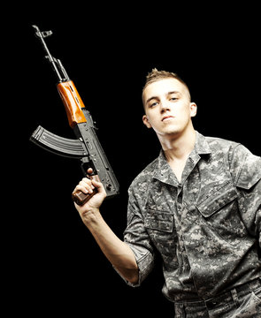 young soldier aiming
