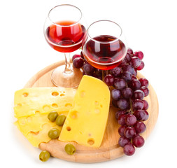 Wine in wineglasses and cheese isolated on white