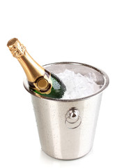 Bottle of champagne in bucket isolated on white