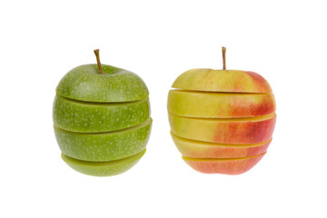 A sliced green and red apple isolated